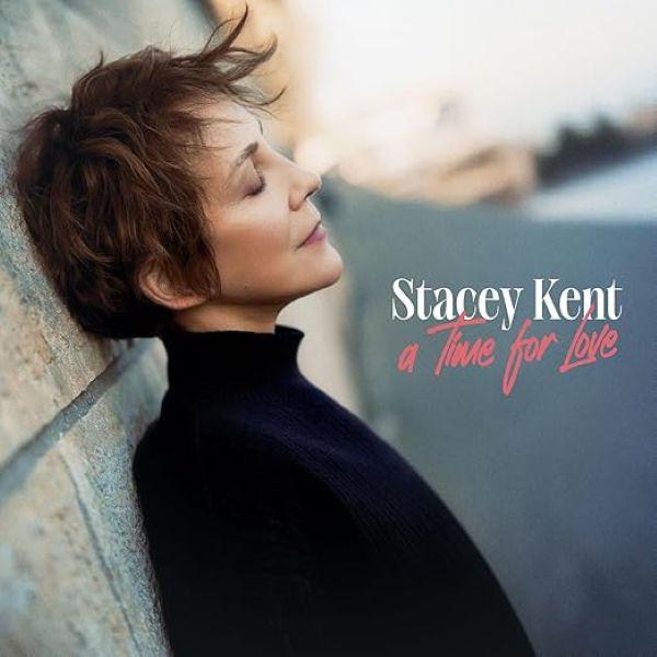 The album cover captures a serene profile portrait of singer Stacey Kent leaning peacefully against a rustic stone wall with her eyes closed.